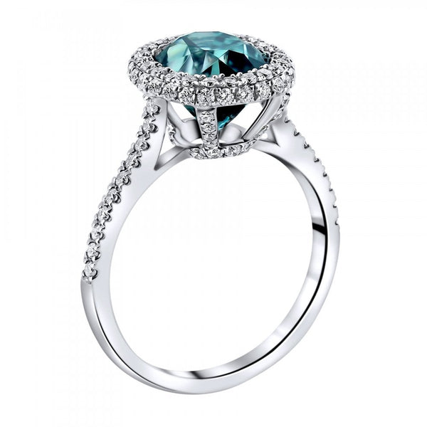 18ct white gold 4.29ct blue zircon & 0.66ct diamond halo ring