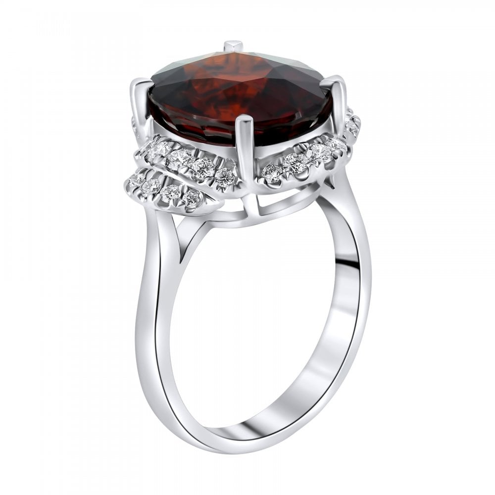 18ct white gold 9.03ct spessartite garnet & 0.47ct diamond ring