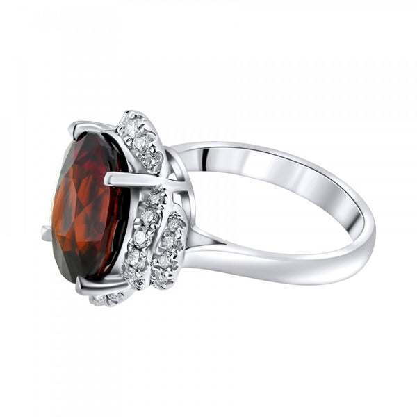 18ct white gold 9.03ct spessartite garnet & 0.47ct diamond ring