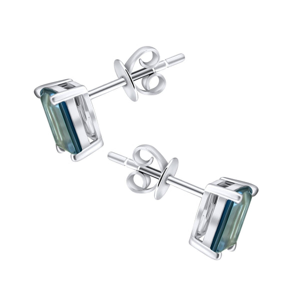 Platinum 7mm x 5mm London blue topaz stud earrings