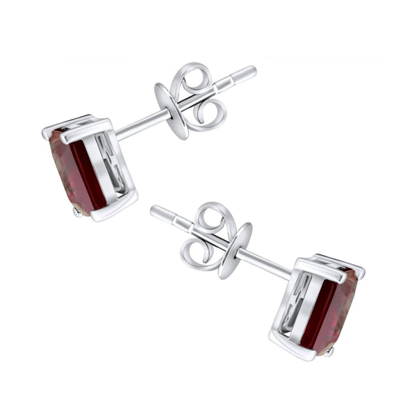 Platinum 7mm x 5mm ruby stud earrings