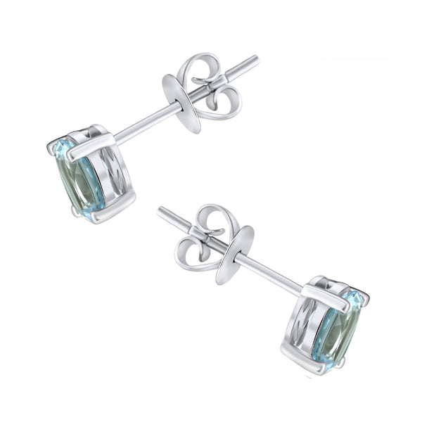 9ct white gold 7mm x 5mm oval auqamarine stud earrings