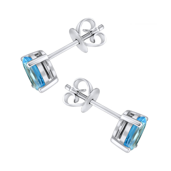 Platinum 7mm x 5mm Swiss blue topaz stud earrings