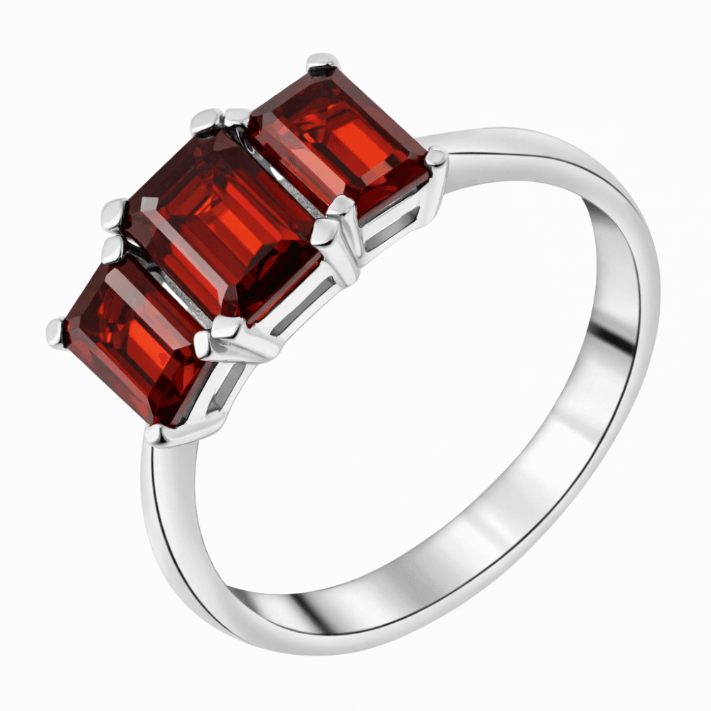 Platinum 7x5mm & 6x4mm garnet 3 stone ring
