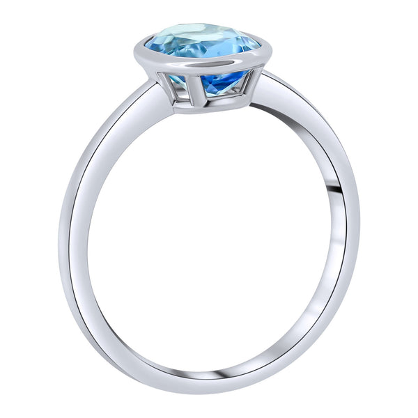 9ct white gold 9mm x 7mm oval blue topaz ring