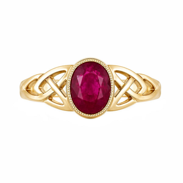 9ct yellow gold 7x5mm ruby Celtic design ring