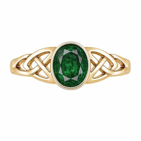 9ct yellow gold 7x5mm emerald Celtic design ring