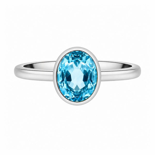 9ct white gold 9mm x 7mm oval blue topaz ring