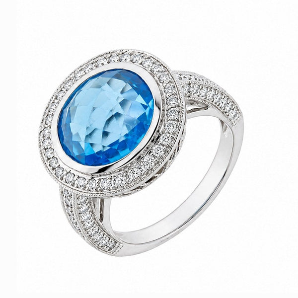 18ct white gold 9.39ct blue topaz & 0.77ct diamond cluster ring