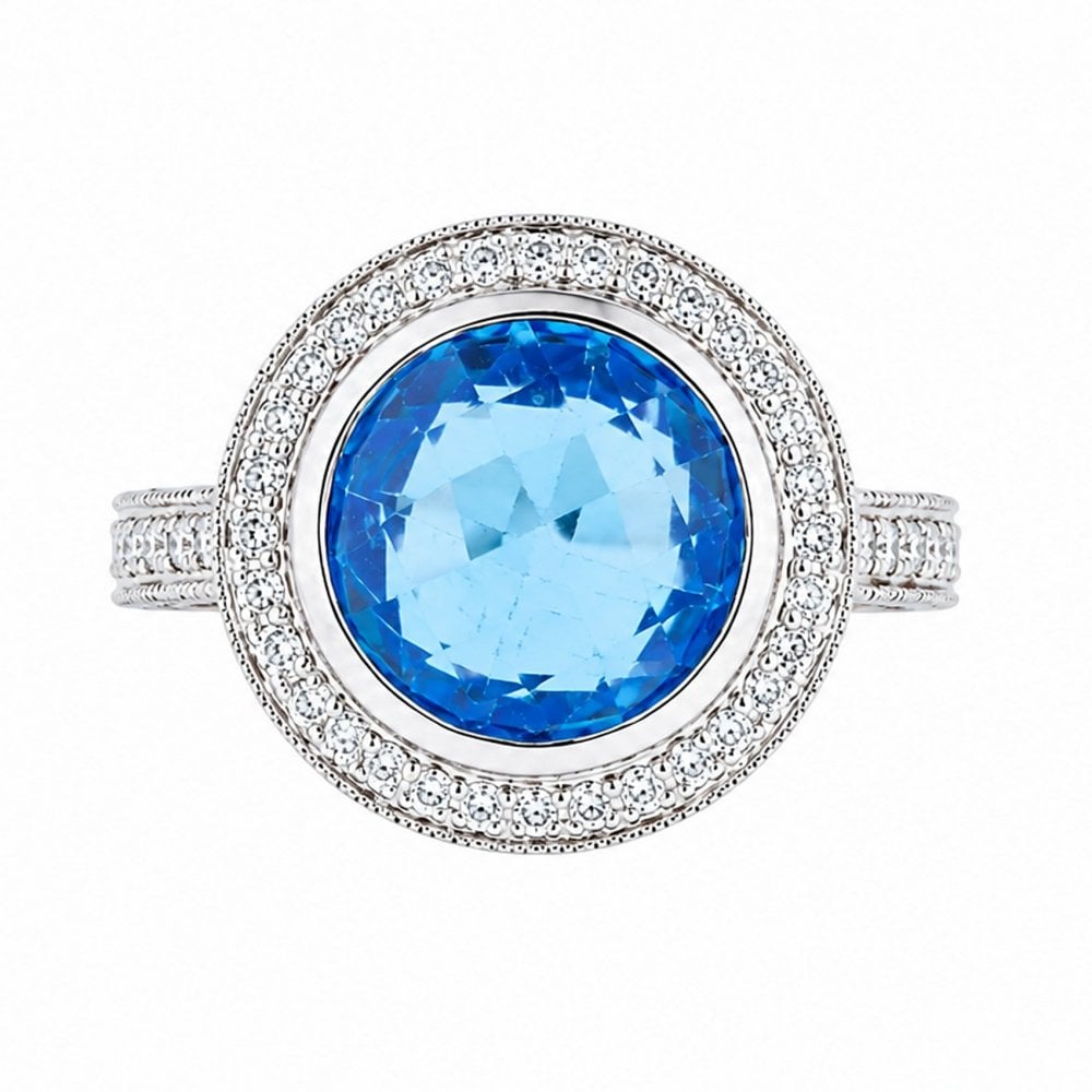 18ct white gold 9.39ct blue topaz & 0.77ct diamond cluster ring